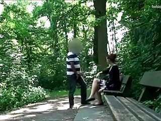 Guy stalks a piece of baggage up a parkland